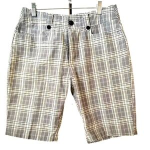 KATE LORD ~ Women’s black and white walking shorts with hints of yellow size M